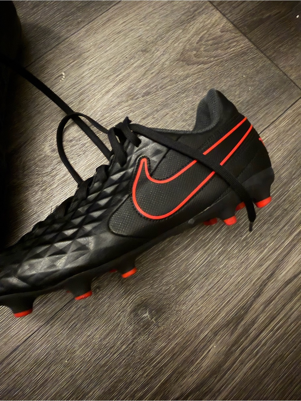 Nike Men's Black Soccer Cleats with Red Accents